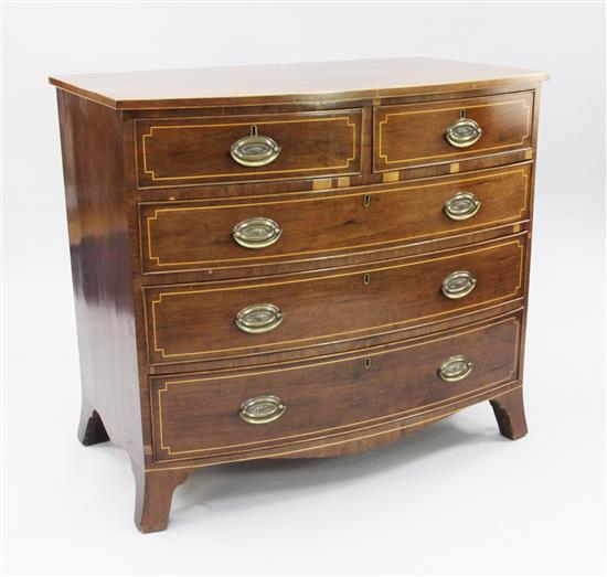A 19th century mahogany and boxwood lined inlaid bowfront chest, W.3ft 5in.